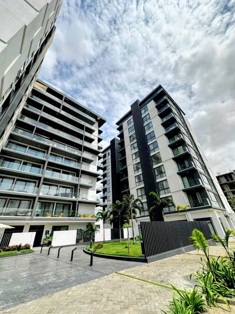 Contemporary apartment buildings with landscaped grounds and private balconies